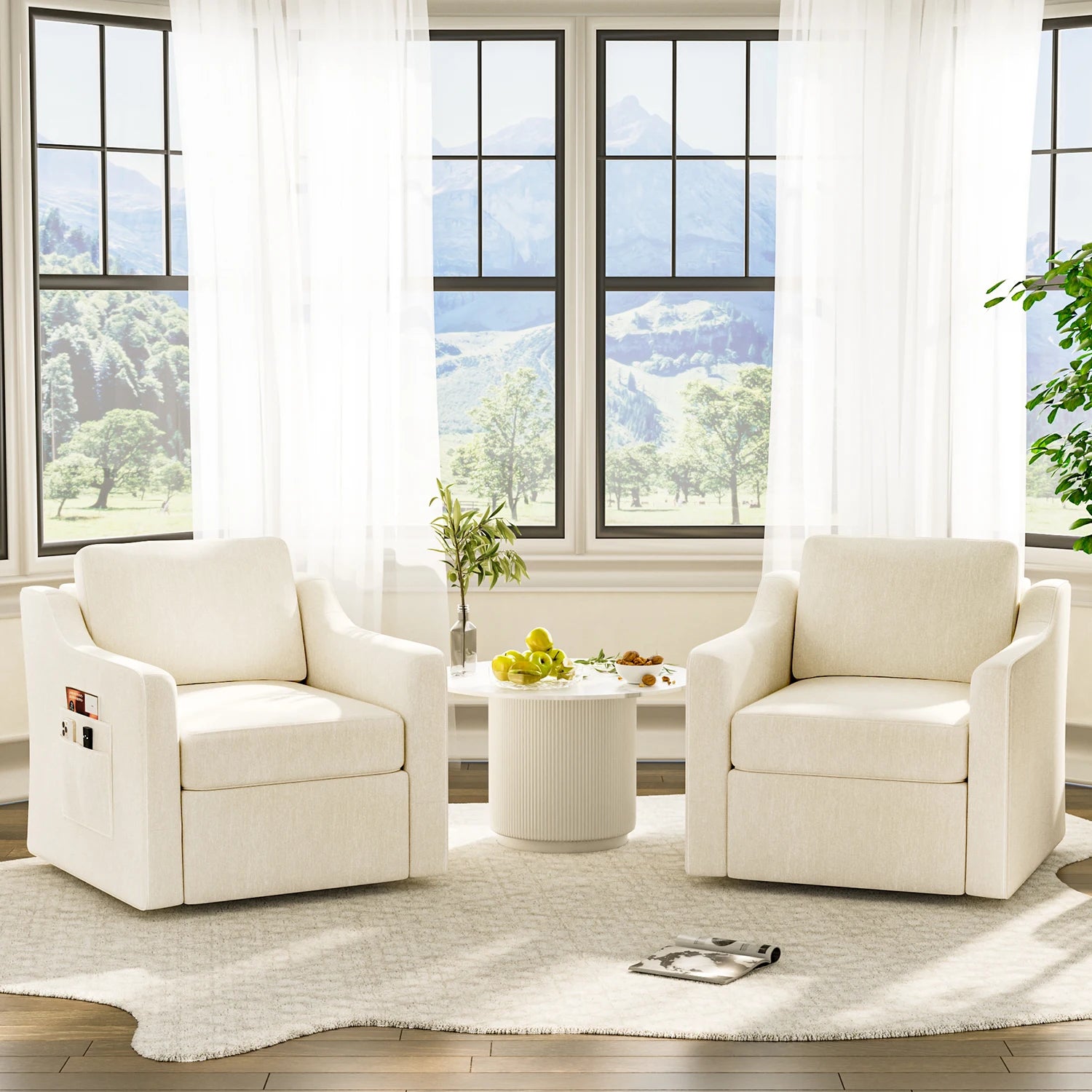 Pair of cream upholstered 360-degree swivel accent chairs with cushioned seats and backrests in a bright living room.